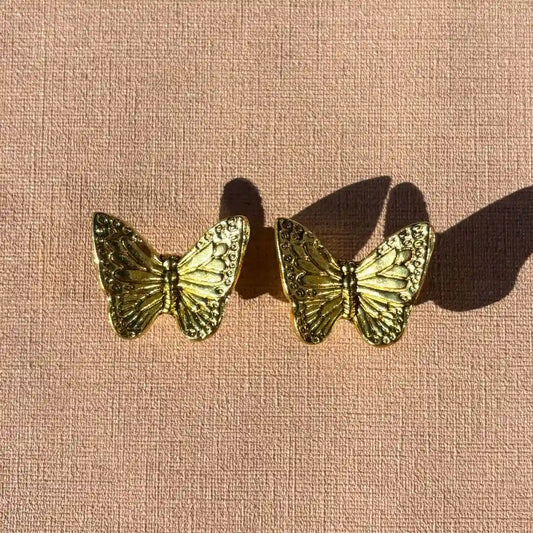 Vlinder deurknop goud